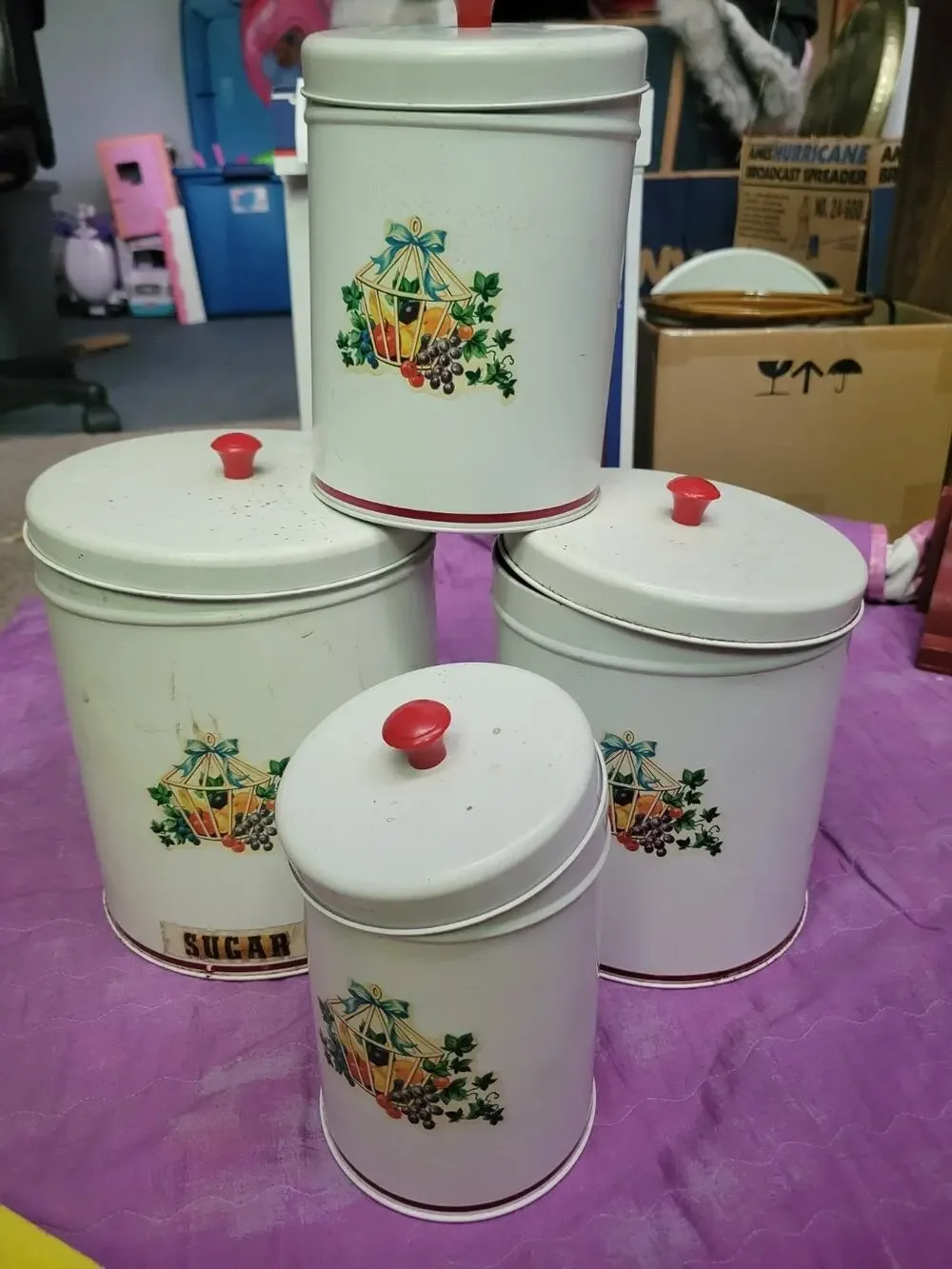 Vintage metal canister set w tops, Fruit decal decoration, Red plastic handles